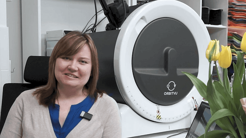 Woman next to Orbitvu E-commerce Studio