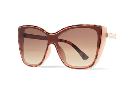 Oversize'owe okulary przeciwsłoneczne cat-eye w brązowym szylkrecie